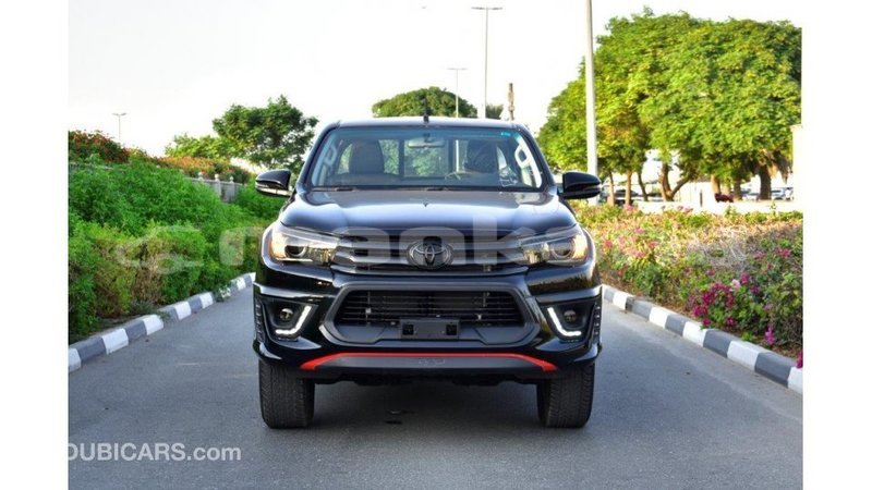 Big with watermark toyota hilux abhasia import dubai 1968