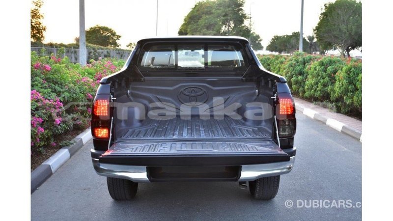 Big with watermark toyota hilux abhasia import dubai 1968