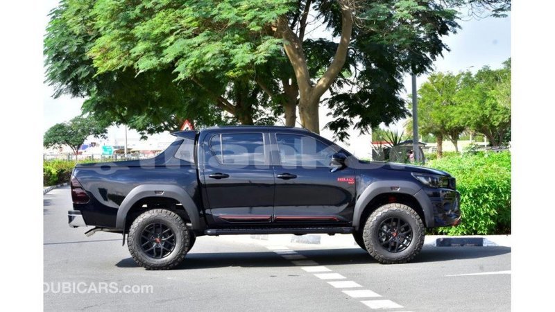 Big with watermark toyota hilux abhasia import dubai 2001