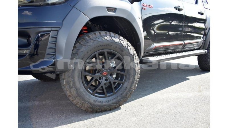Big with watermark toyota hilux abhasia import dubai 2001