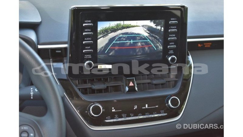 Big with watermark toyota corolla abhasia import dubai 2004