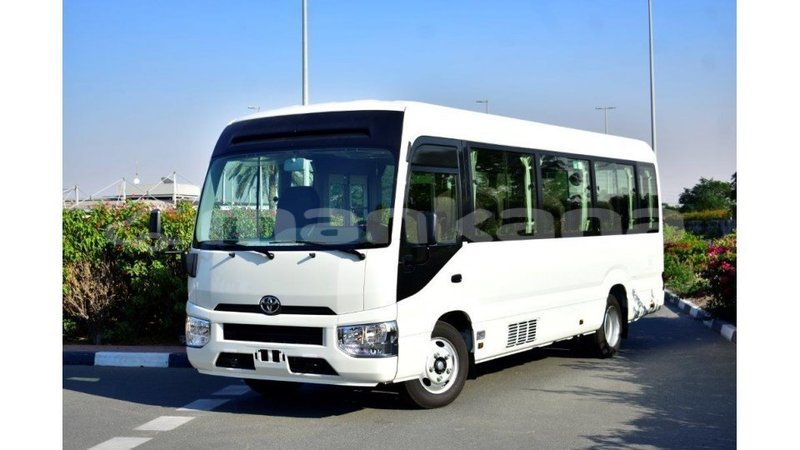 Big with watermark toyota coaster abhasia import dubai 2005