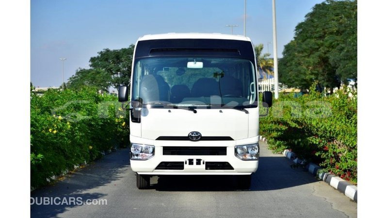 Big with watermark toyota coaster abhasia import dubai 2005