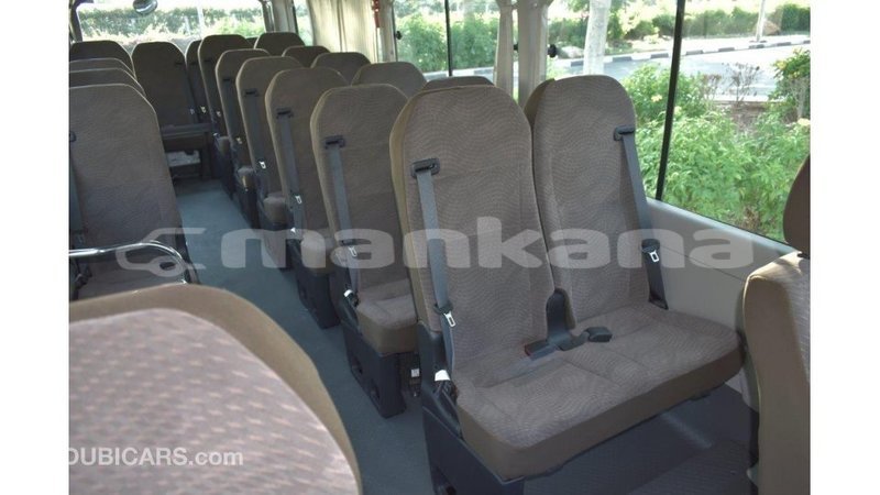 Big with watermark toyota coaster abhasia import dubai 2005