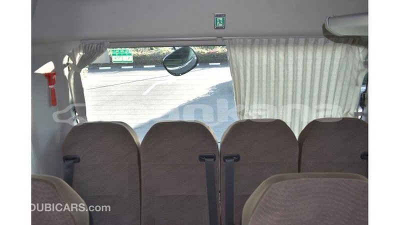 Big with watermark toyota coaster abhasia import dubai 2005