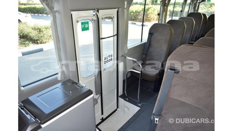 Big with watermark toyota coaster abhasia import dubai 2005