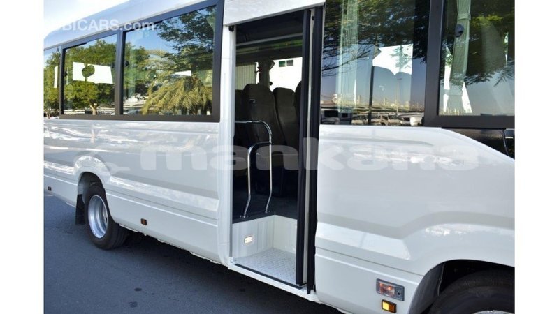 Big with watermark toyota coaster abhasia import dubai 2005