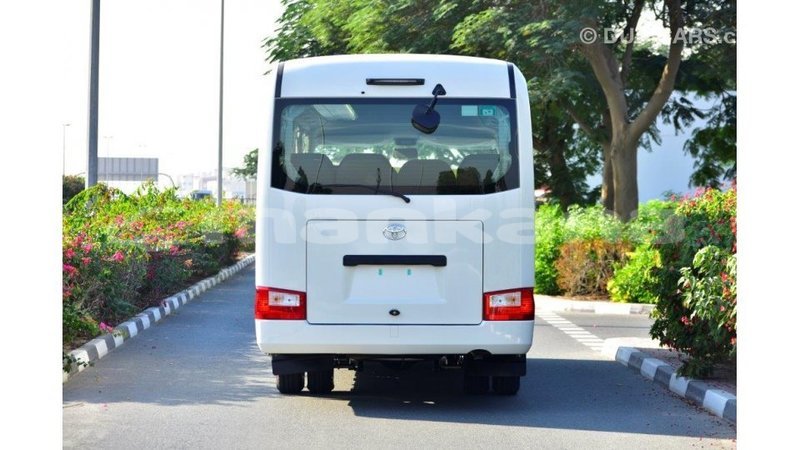 Big with watermark toyota coaster abhasia import dubai 2005