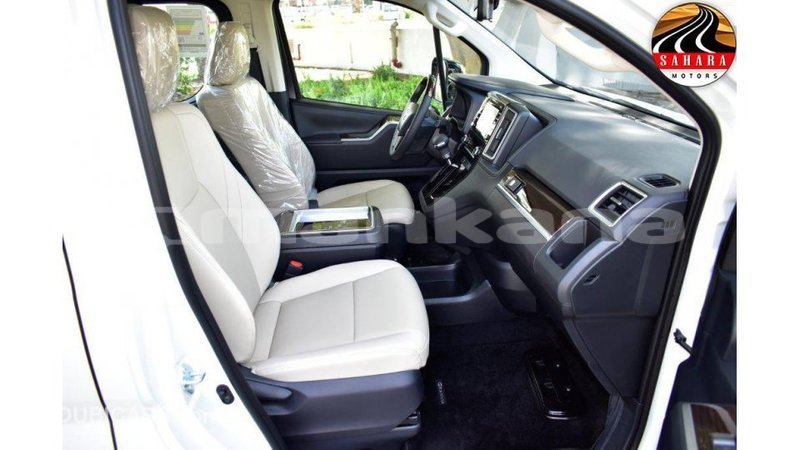 Big with watermark toyota granvia abhasia import dubai 2104