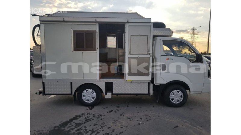 Big with watermark kia carens abhasia import dubai 2128