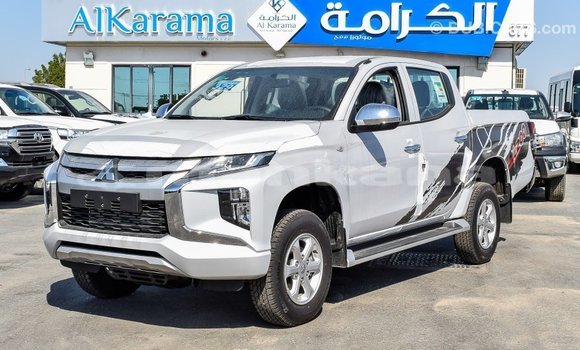 Buy Import Mitsubishi L200 White Car in Import - Dubai in Abhasia Buy Import Mitsubishi L200 White Car in Import - Dubai in Abhasia