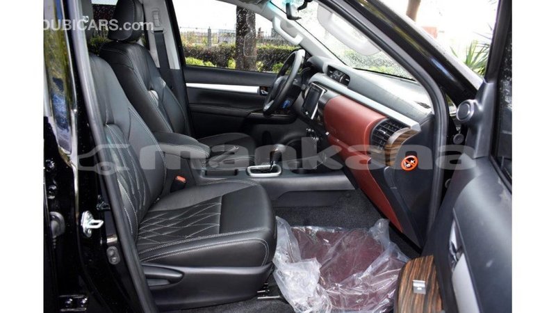 Big with watermark toyota hilux abhasia import dubai 2153