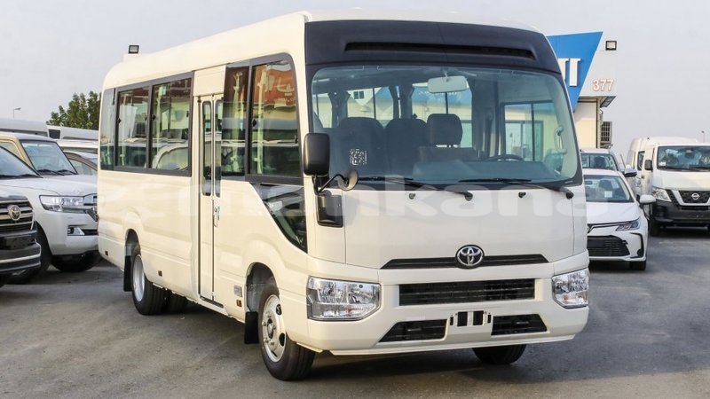 Big with watermark toyota coaster abhasia import dubai 2196