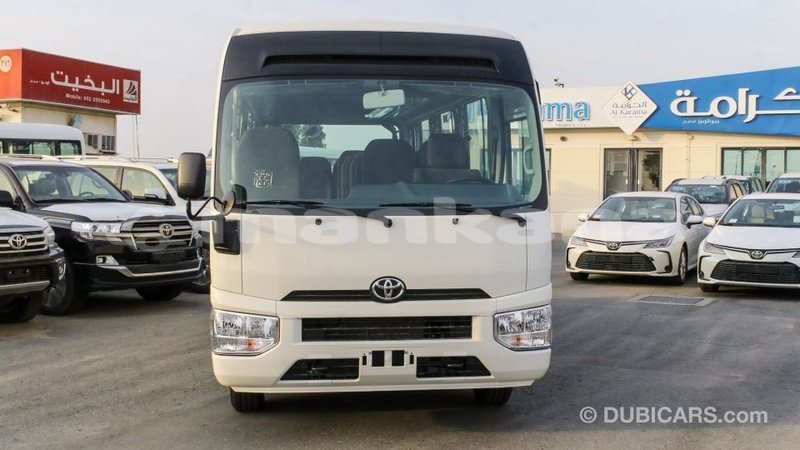 Big with watermark toyota coaster abhasia import dubai 2196