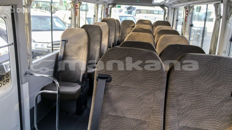 Big with watermark toyota coaster abhasia import dubai 2196