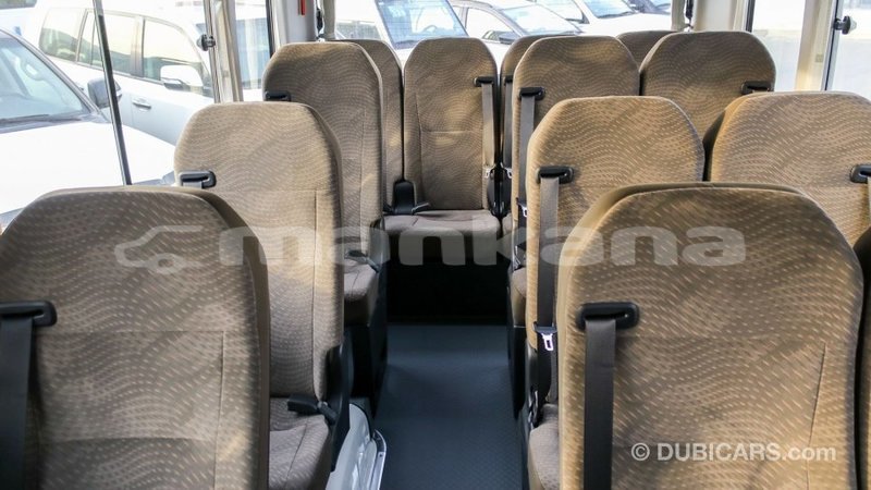 Big with watermark toyota coaster abhasia import dubai 2196