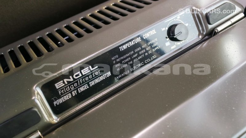 Big with watermark toyota coaster abhasia import dubai 2196