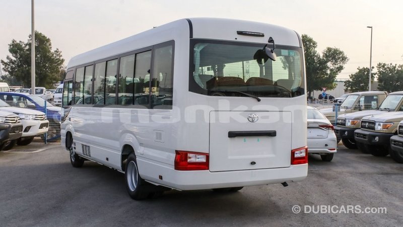 Big with watermark toyota coaster abhasia import dubai 2196
