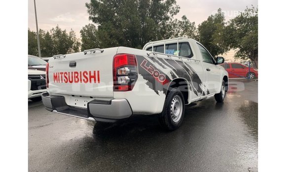 Buy Import Mitsubishi L200 White Car in Import - Dubai in Abhasia Buy Import Mitsubishi L200 White Car in Import - Dubai in Abhasia
