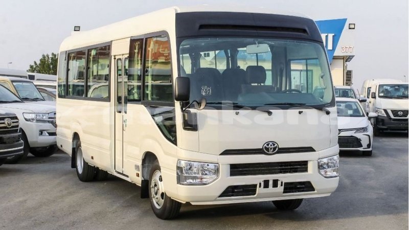 Big with watermark toyota coaster abhasia import dubai 2355