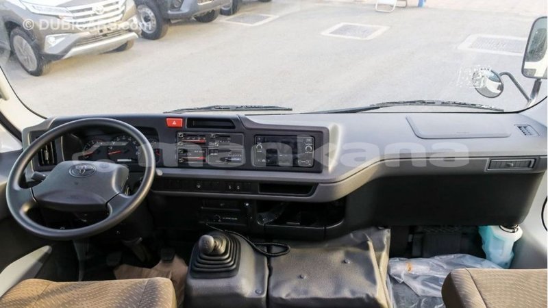 Big with watermark toyota coaster abhasia import dubai 2356