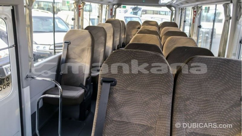 Big with watermark toyota coaster abhasia import dubai 2356