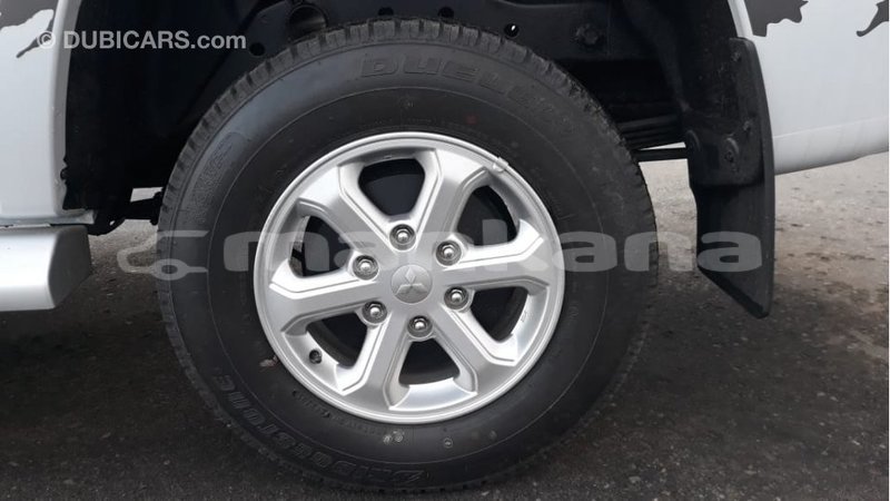 Big with watermark mitsubishi l200 abhasia import dubai 2393