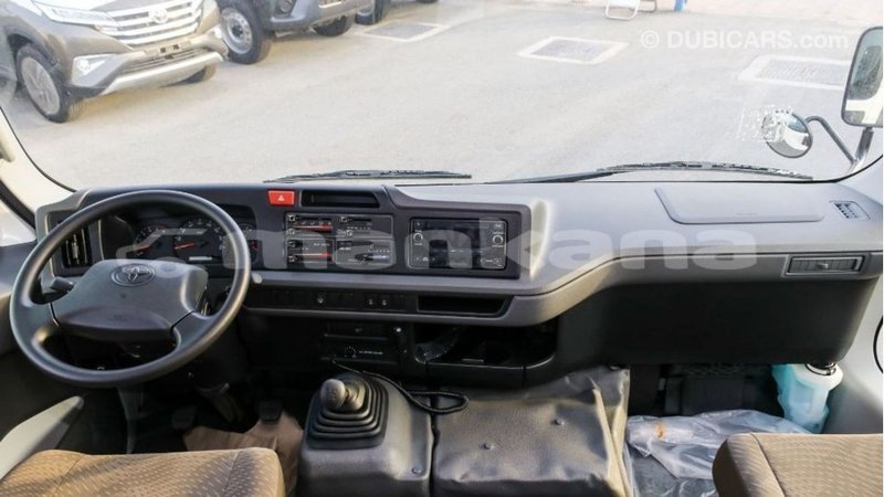 Big with watermark toyota coaster abhasia import dubai 2704