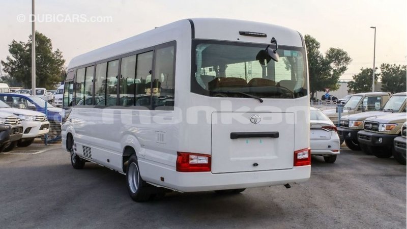 Big with watermark toyota coaster abhasia import dubai 2704