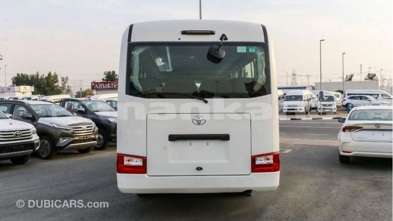 Big with watermark toyota coaster abhasia import dubai 2704