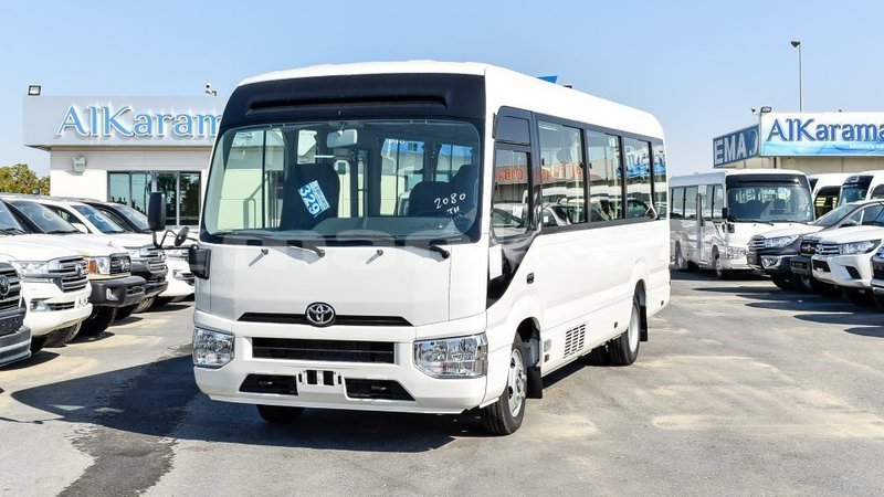 Big with watermark toyota coaster abhasia import dubai 3277