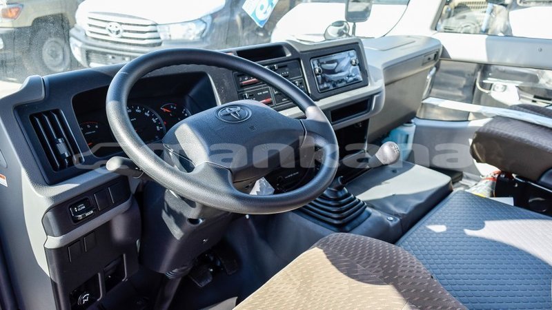 Big with watermark toyota coaster abhasia import dubai 3277