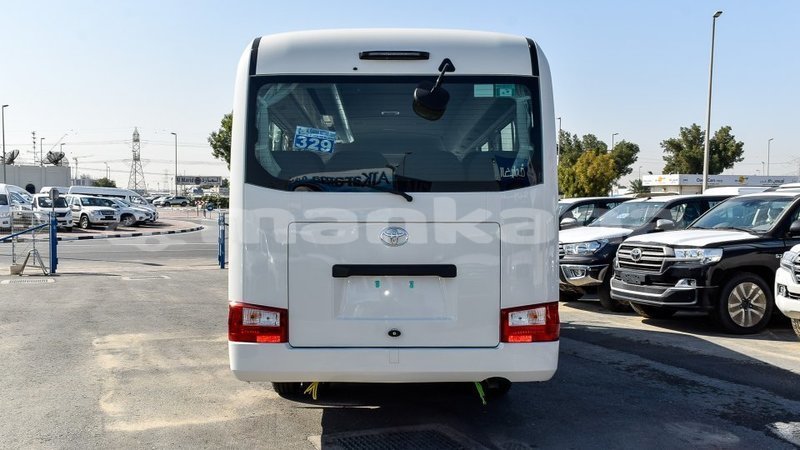 Big with watermark toyota coaster abhasia import dubai 3277