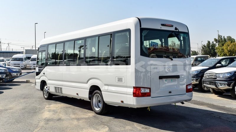 Big with watermark toyota coaster abhasia import dubai 3277