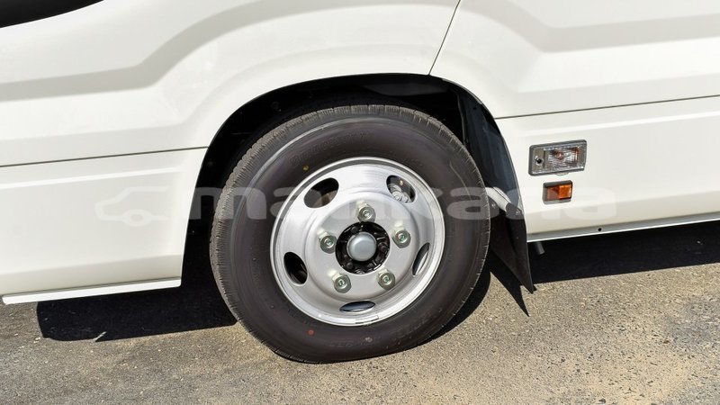 Big with watermark toyota coaster abhasia import dubai 3277