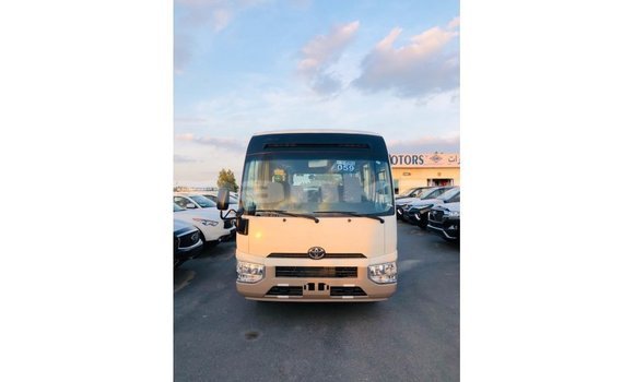 Buy Import Toyota Coaster White Car in Import - Dubai in Abhasia