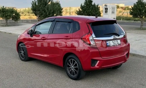 Buy Used Honda FIT Red Car in Gudauta in Abhasia Buy Used Honda FIT Red Car in Gudauta in Abhasia